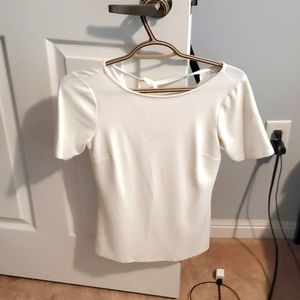 White t shirt with a tie at the back